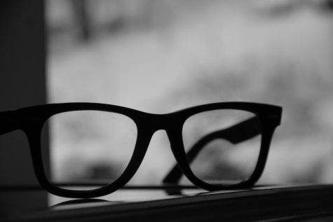 His soon-to-be iconic glasses. Photo credit: Brent Allan Johnson.